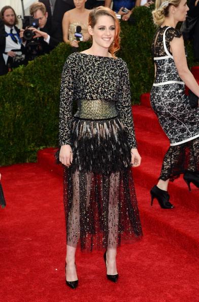 Twilight star Kristen Stewart shimmered in a black Chanel illusion gown.